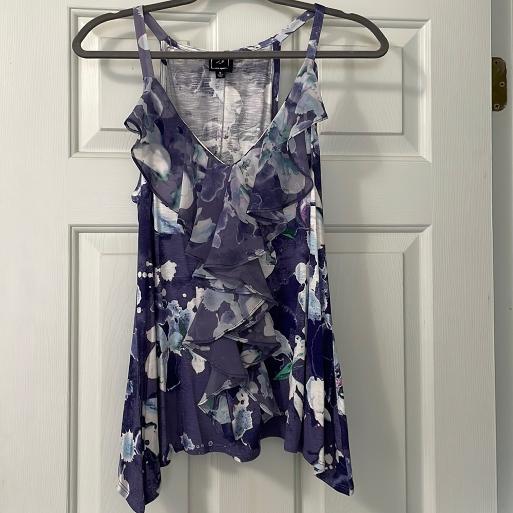 Beautiful flower tank with ruffle in front.  Size small.